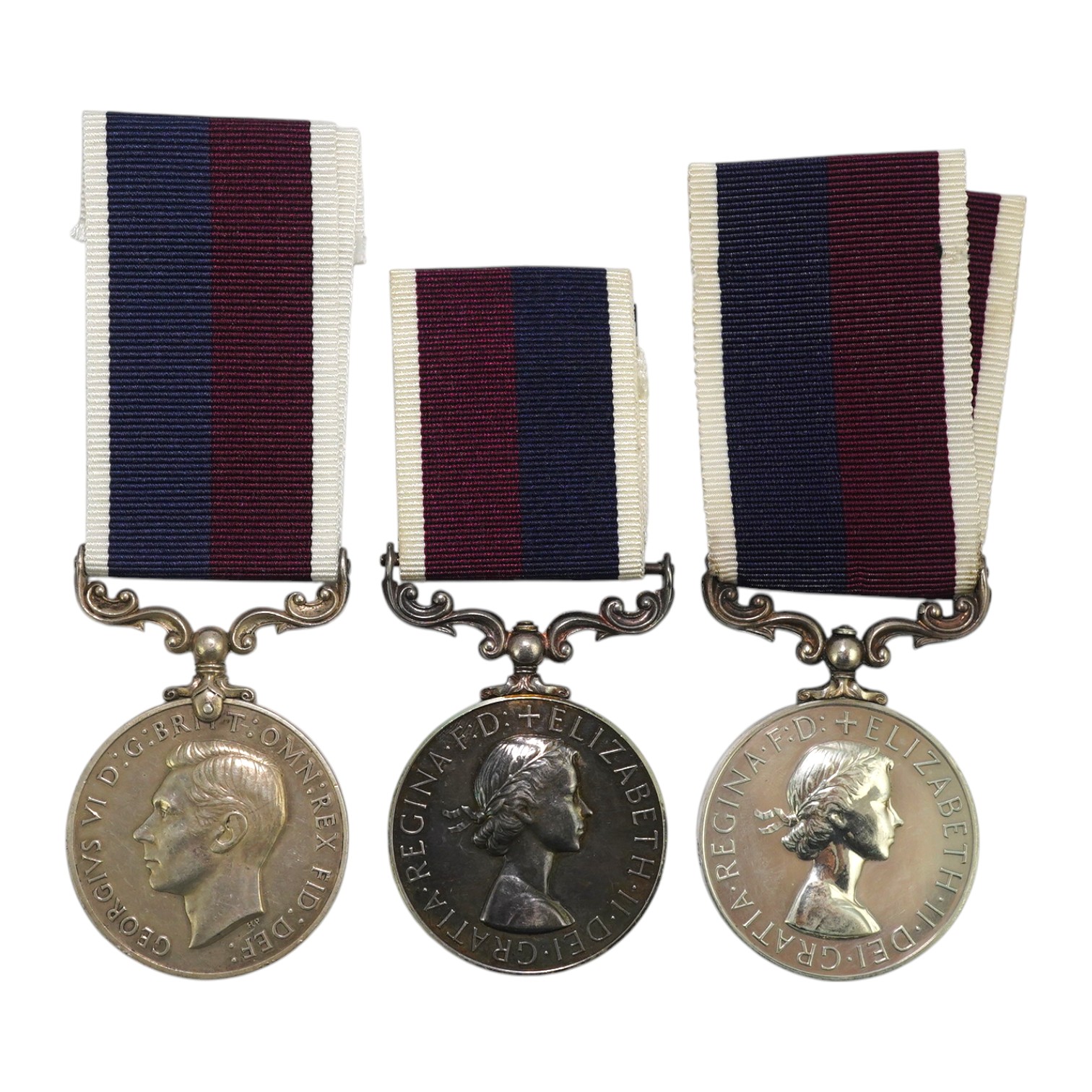 Three GVI and later Royal Air Force Long Service and Good Conduct Medals; GVI (renamed) to 362743 Act.F.Sgt.A.J.Vizer R.A.F; ERII to Sgt M R Bryant (R8225378) RAF; ERII to CPL P C W Outhwaite (E4272344) RAF. Condition -